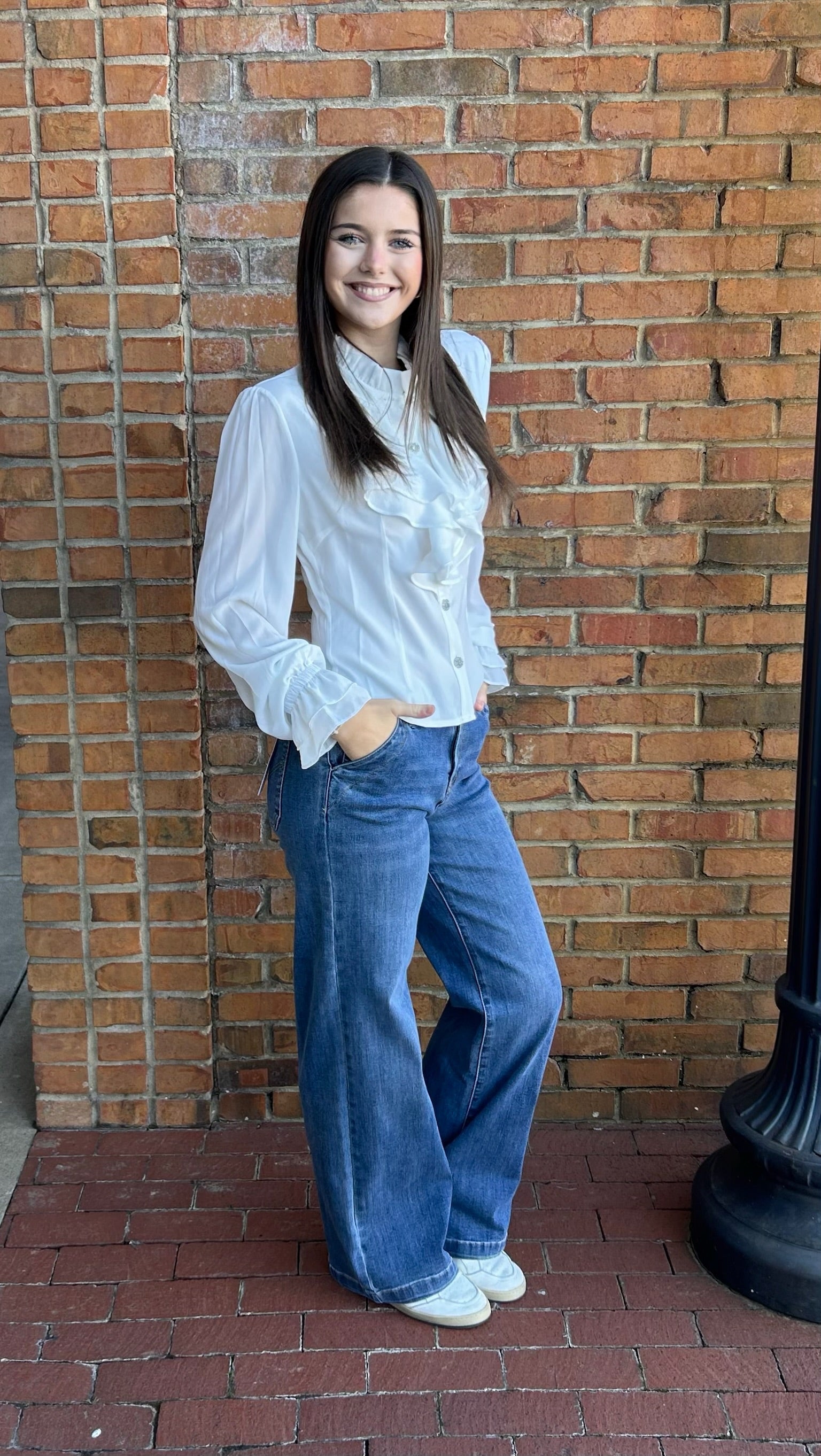 White blouse with rhinestone buttons