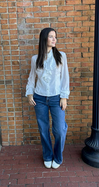 White blouse with rhinestone buttons