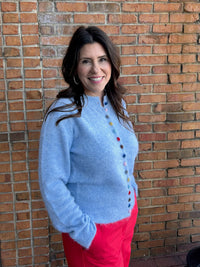 blue cardigan w multi colored buttons
