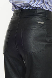 Black leather skinny jeans