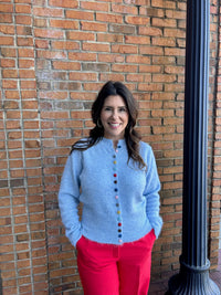 blue cardigan w multi colored buttons