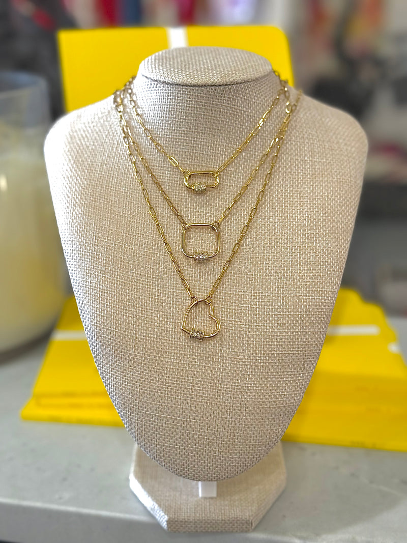 Toggle necklaces with three charms