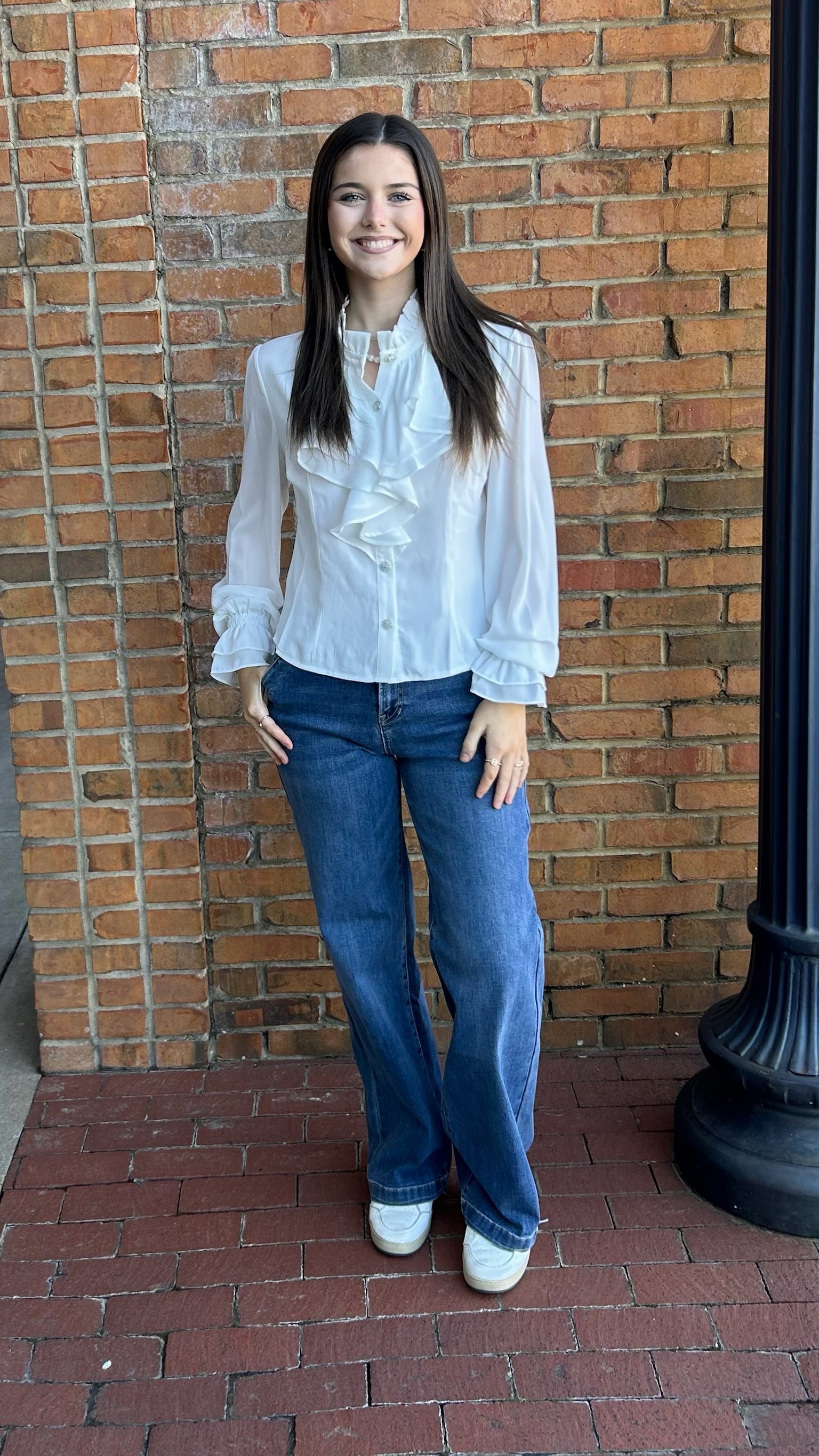 White blouse with rhinestone buttons